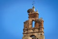 Bell tower with a storks nest in Plasencia old town. Royalty Free Stock Photo