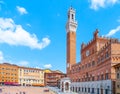 Bell tower, Torre del Mangia, of the Town Hall, Palazzo Pubblico, at the Piazza del Campo, Siena, Italy Royalty Free Stock Photo