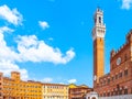 Bell tower, Torre del Mangia, of the Town Hall, Palazzo Pubblico, at the Piazza del Campo, Siena, Italy Royalty Free Stock Photo