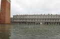 Bell Tower in Venice Italy and the water in the square during th Royalty Free Stock Photo