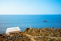 Bell tower and white church at Loutro, Chania, Crete. Royalty Free Stock Photo