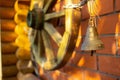 Bell on traditional russian village house made of logs. Authentic landscape Royalty Free Stock Photo