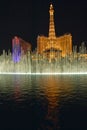 Bellagio Casino Water Show at night with Paris Casino and Eiffel Tower, Las Vegas, NV Royalty Free Stock Photo