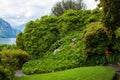 Bellagio city on Lake Como, Italy. Lombardy region. Italian famous landmark, Villa Melzi Park. Botanic Garden plants and trees Royalty Free Stock Photo