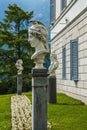 Bellagio city on Lake Como, Italy. Lombardy region. Italian famous landmark, Villa Melzi Park. sculpture of Men head Royalty Free Stock Photo