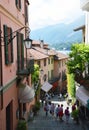 BELLAGIO, ITALY - MAY 14, 2017: tourists in Salita Serbelloni picturesque small town street view in Bellagio, Lake Como, Italy Royalty Free Stock Photo