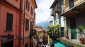 BELLAGIO, ITALY - MAY 14, 2017: tourists in Salita Serbelloni picturesque small town street view in Bellagio, Lake Como, Italy. Royalty Free Stock Photo