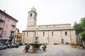 Bellagio. Lake Como. Basilica di San Giacomo in Bellagio. Square with Fountain in Old Town