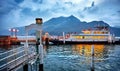 Bellagio village on lake Como, Italy. Ferryboat by landing Royalty Free Stock Photo
