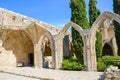 Bellapais, Cyprus - Oct 4th 2018: Ruins of historical Bellapais Abbey with ancient walls and arches. The medieval monastery is