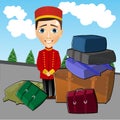 Bellboy standing near luggage