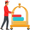 Bellboy worker with hotel baggage trolley. Hotel employee, doorman in uniform during work