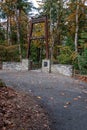 Bellevue Botanical Garden, entrance to the Ravine Experience suspension bridge with fall foli