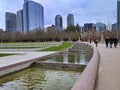 Wide view of families enjoying walking and biking around the circular ring of Bellevue Downtown Park