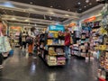 Bellevue, WA USA - circa December 2022: Wide view of people Christmas shopping for their children inside a toy store in the