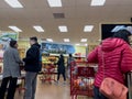 Bellevue, WA USA - circa December 2022: Wide view of people shopping inside a Trader Joes grocery store Royalty Free Stock Photo