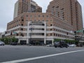 Bellevue, WA USA - circa June 2020: Street view of the large, Bellevue Place building, containing hotels, offices, shopping, and