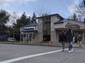 Bellevue, WA USA - circa March 2021: Street view of people shopping in downtown Bellevue while wearing masks