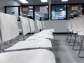 Bellevue DMV waiting room with white chairs, nobody is around Royalty Free Stock Photo