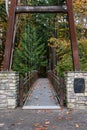 BELLEVUE, WA/USA Ã¢â¬â NOVEMBER 5, 2019: Bellevue Botanical Garden, entrance to the Ravine Experience suspension bridge with fall fo