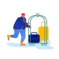 Bellhop, Bellboy or Bellman Pushing Luggage Cart with Suitcases, Hotel Staff Character in Blue Uniform Royalty Free Stock Photo