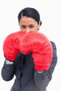 Belligerent saleswoman with boxing gloves