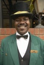 Bellman smiling in front of historic Norfolk Hotel in Nairobi, Kenya, Africa