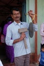 The bellringer calls for a Mass in Chunakhali, West Bengal, India