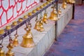 Bells of different size hanging in Taal Barahi Mandir temple, Pokhara, Nepal Royalty Free Stock Photo