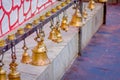 Bells of different size hanging in Taal Barahi Mandir temple, Pokhara, Nepal Royalty Free Stock Photo