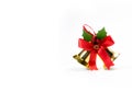 Bells with a red bow isolated on white background. Christmas decoration Royalty Free Stock Photo