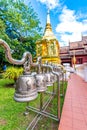 Bells in Wat Phra Singh temple, near the Chiang Mai city, Thailand. Symbol of hope and spirituality. Golden pagoda with ancient