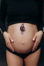 belly body pregnant woman posing black background