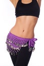 Belly Dancer Wearing a Purple Coin Belt and Workout Clothing