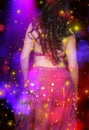 Belly Dancer wearing purple dance costume close up with bokeh Royalty Free Stock Photo