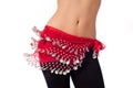 Belly Dancer Wearing a Red Coin Belt and Shaking her Hips