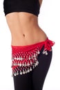 Belly Dancer Wearing a Red Coin Belt and Workout Clothing