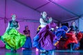 Belly dancers in gypsy costumes dancing on stage