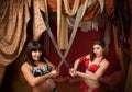 Belly Dancers Holding Swords Royalty Free Stock Photo