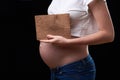 Belly of pregnant woman. layout for the inscription