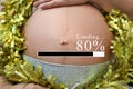 Belly of pregnant women and loading text in concept of time in c Royalty Free Stock Photo