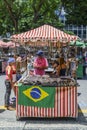 Indigenous Brazilian man selling arts and crafts at a street mar