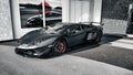 Matte black Lamborghini Aventador SVJ - front side