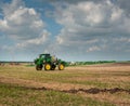 Belogorye, Khmelnytsky region, UKRAINE - August 19, 2021: John Deere self-propelled sprayer at the demonstration of agricultural