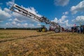 Belogorye, Khmelnytsky region, UKRAINE - August 19, 2021: sprayer boom trailed sprayer fertilizer on at the demonstration of