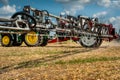 Belogorye, Khmelnytsky region, UKRAINE - August 19, 2021: tractor with trailed sprayer fertilizer on at the demonstration of