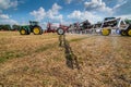 Belogorye, Khmelnytsky region, UKRAINE - August 19, 2021: tractor with trailed sprayer fertilizer on at the demonstration of