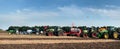 Belogorye, Khmelnytsky region, UKRAINE - August 19, 2021: tractors with seeders, plow, harrows at the demonstration of