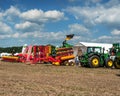 Belogorye, Khmelnytsky region, UKRAINE - August 19, 2021: tractors with seeders, plow, harrows, equipment at the demonstration of