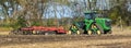 John Deere 9570RX Quad Track tractor pullinl a Sunflower 4610 Disk Ripper